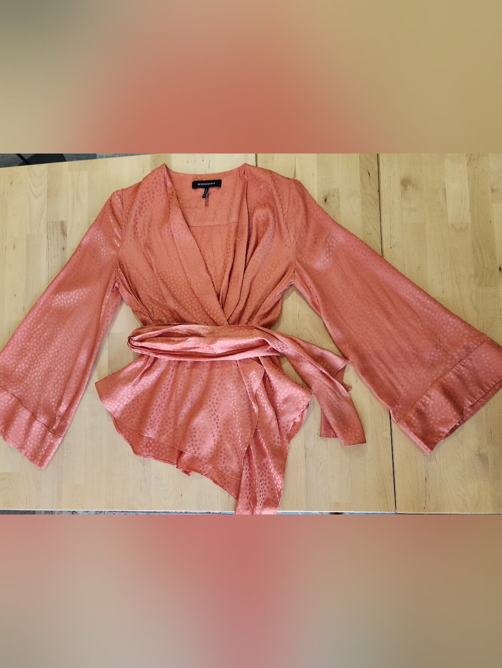 BCBG Max Azria | Textured Satin Bell Sleeve Wrap Top Blouse | Papaya | XS - Picture 7 of 12